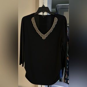 Large black 3/4 sleeve v-neck top with beading around neckline
